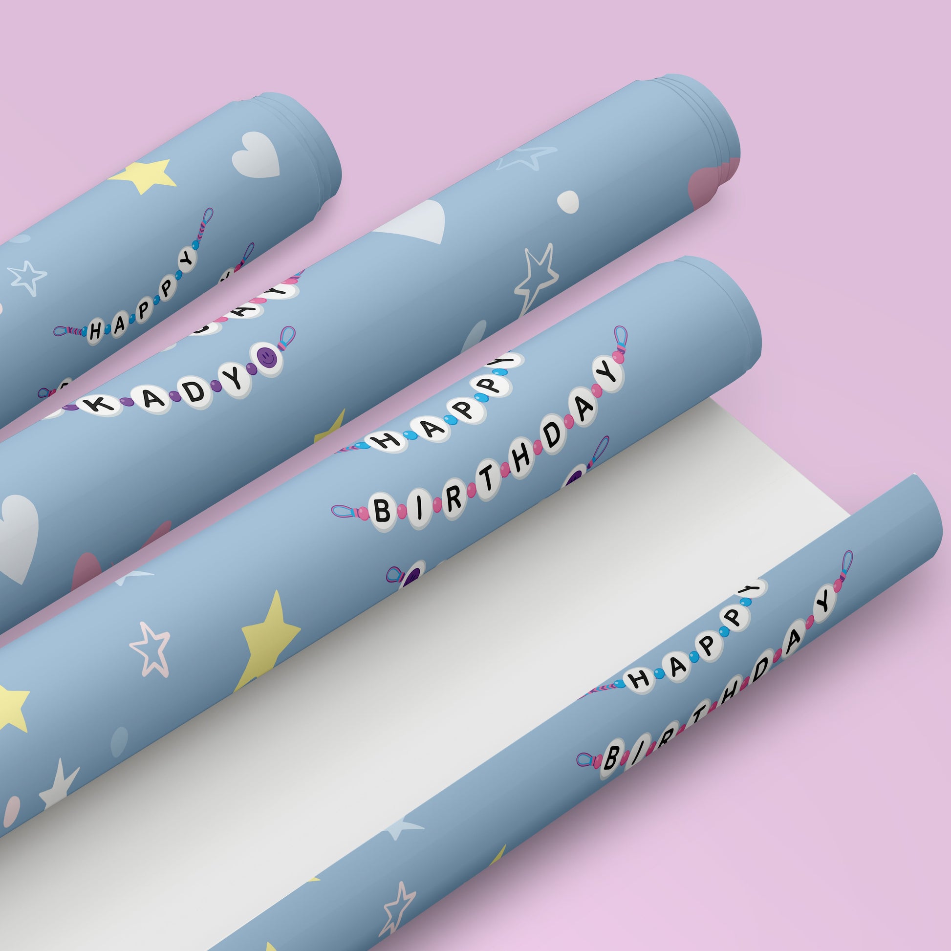 Personalised bracelet birthday wrapping paper featuring a custom name friendship bracelet design on blue gift wrap with stars, hearts and butterflies.
