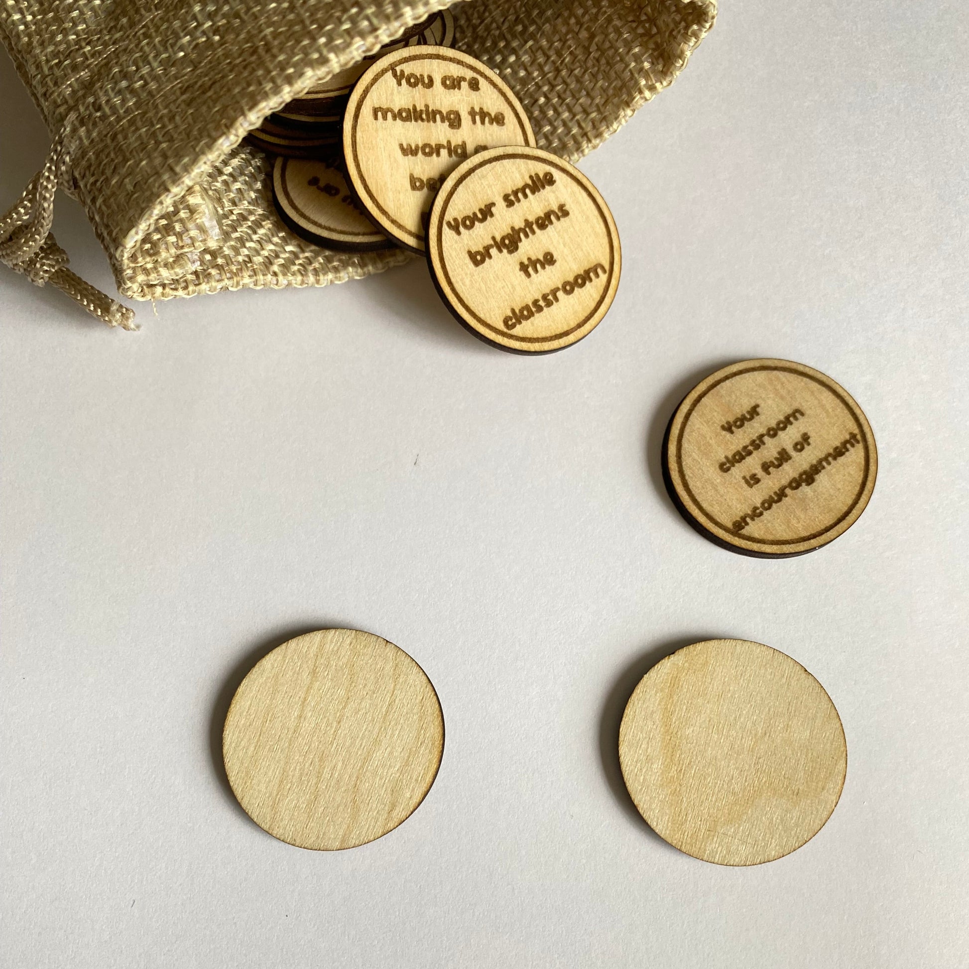End of term teacher gift featuring engraved wooden affirmation tokens with encouraging messages.