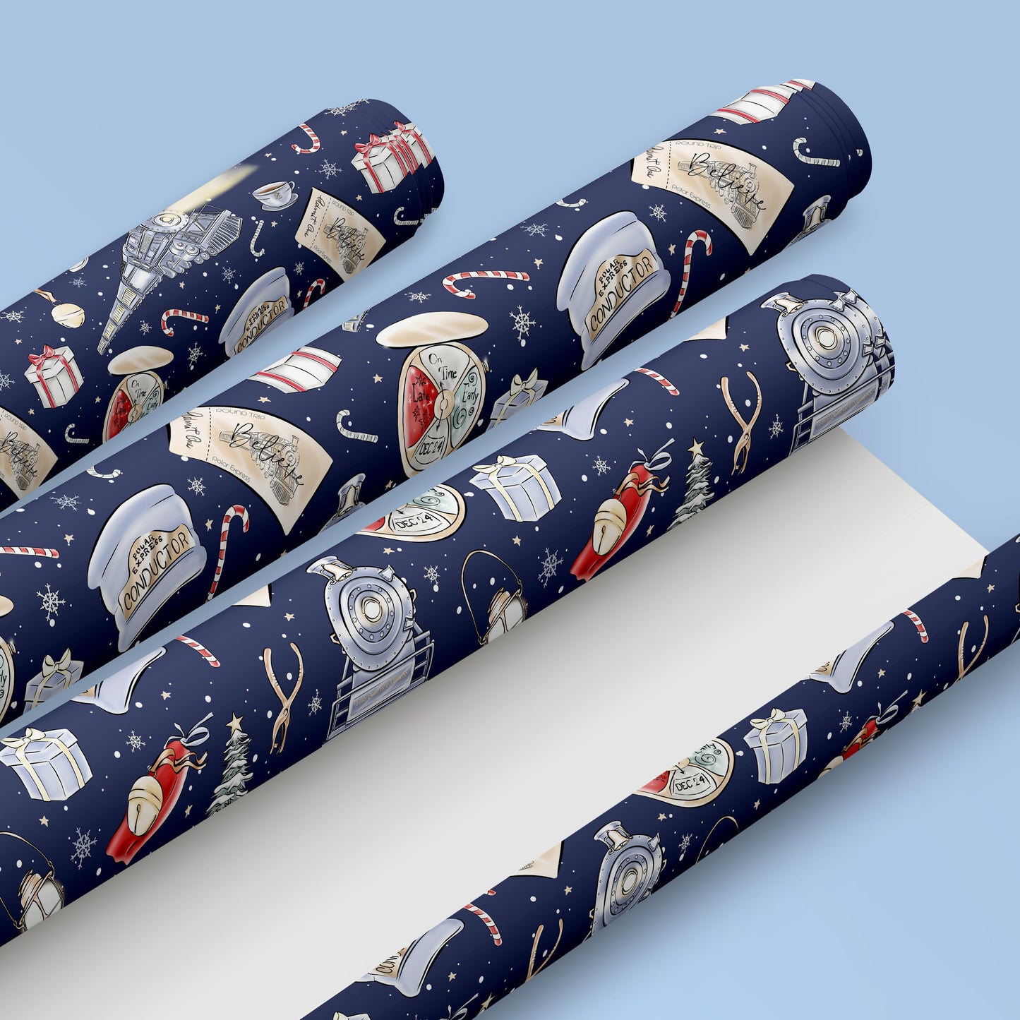 Three rolls of festive wrapping paper with holiday designs on a light blue background.