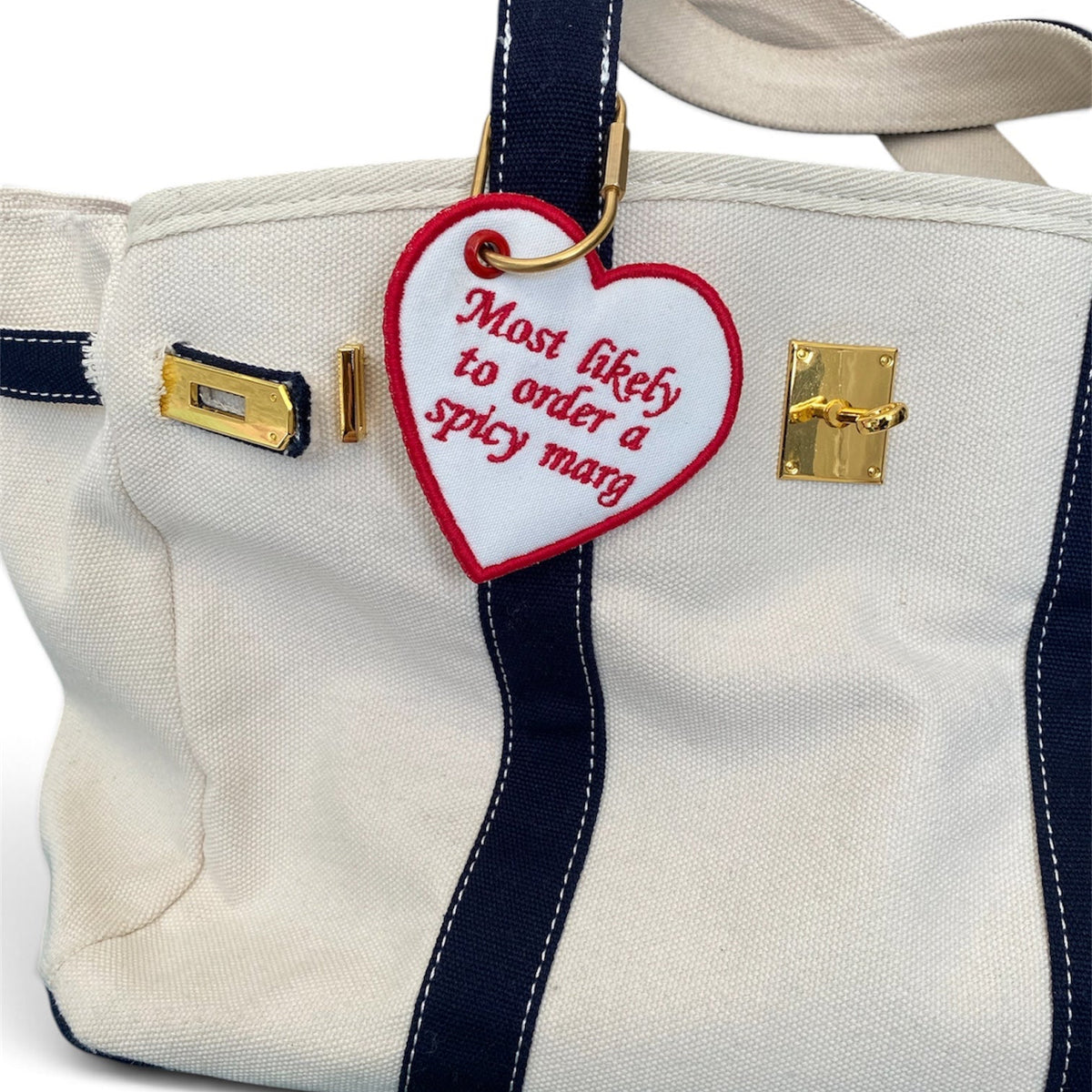 Funny heart-shaped spicy margarita bag tag, a playful gift for cocktail lovers and a cute accessory for luggage or bags.